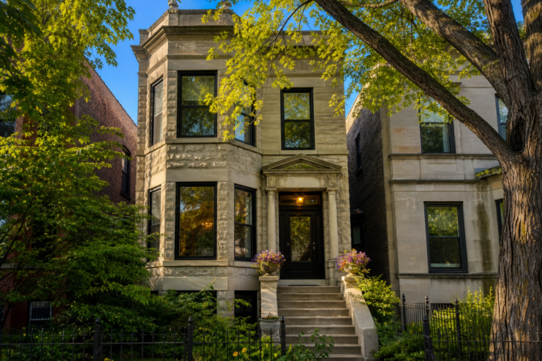 A Chicago greystone house on a sunny residential street