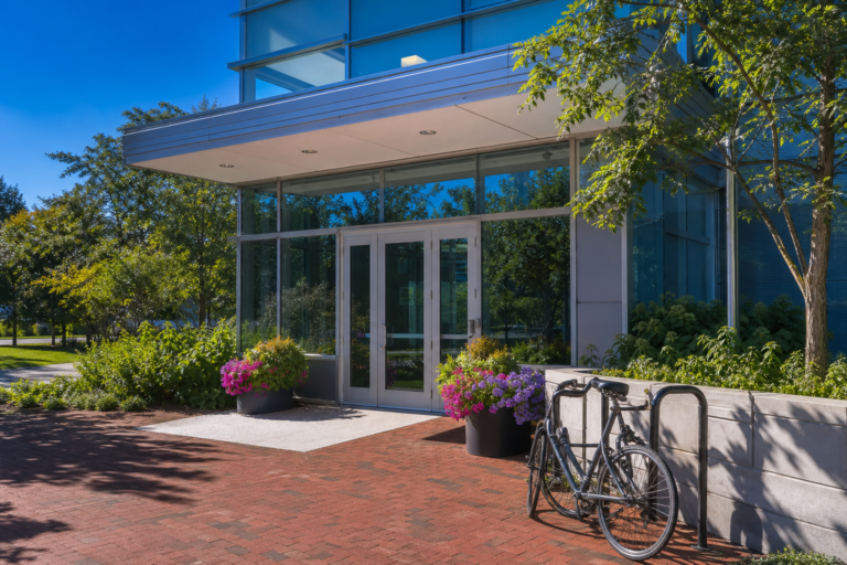 The entrance of a community health center on a sunny morning